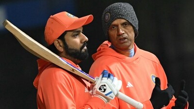 India captain Rohit Sharma speaks with head coach Rahul Dravid (AFP) India captain Rohit Sharma speaks with head coach Rahul Dravid (AFP)