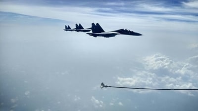 IAF's Su-30 MKI fighters refueling over sea. IAF's Su-30 MKI fighters refueling over sea.