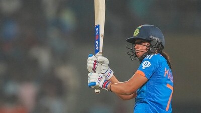 India's batter Harmanpreet Kaur plays a shot during the 2nd T20I cricket match between India and Australia, at DY Patil stadium, in Navi Mumbai (PTI) India's batter Harmanpreet Kaur plays a shot during the 2nd T20I cricket match between India and Australia, at DY Patil stadium, in Navi Mumbai (PTI)