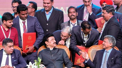 Tamil Nadu Chief Minister MK Stalin with Mahindra Group Chairman Anand Mahindra, Minister for Industries TRB Rajaa along with other dignitaries at the valedictory ceremony of the Global Investors Meet-2024, at Nandambakkam in Chennai. (PTI)