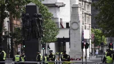 British police officers secure the area around The Cenotaph war memorial on Whitehall in central London. (AP) British police officers secure the area around The Cenotaph war memorial on Whitehall in central London. (AP)