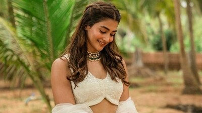The shaadi season is here. As many of your favourite celebrities attend weddings of their close friends and family, it only makes sense for you to steal style inspiration from them to upgrade your closet and steal the show as a wedding guest or bridesmaid. Your latest sartorial pick comes from Pooja Hegde's personal wardrobe. Scroll down to see what the actor wore for attending a wedding in Mangalore, Karnataka. (Instagram) The shaadi season is here. As many of your favourite celebrities attend weddings of their close friends and family, it only makes sense for you to steal style inspiration from them to upgrade your closet and steal the show as a wedding guest or bridesmaid. Your latest sartorial pick comes from Pooja Hegde's personal wardrobe. Scroll down to see what the actor wore for attending a wedding in Mangalore, Karnataka. (Instagram)