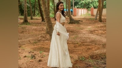 Pooja shared the pictures on social media with the caption, "Coconut." The post shows Pooja dressed in an ivory lehenga set. The ensemble is from the shelves of the clothing label Devnaagri. It is called the Ivory Embroidered Silk Chanderi Lehenga Set and is available on the brand's website. Adding it to your closet will cost you <span class='webrupee'>₹</span>72,500. (Instagram) Pooja shared the pictures on social media with the caption, "Coconut." The post shows Pooja dressed in an ivory lehenga set. The ensemble is from the shelves of the clothing label Devnaagri. It is called the Ivory Embroidered Silk Chanderi Lehenga Set and is available on the brand's website. Adding it to your closet will cost you <span class='webrupee'>₹</span>72,500. (Instagram)