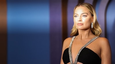 After being delayed due to the strikes, the 14th Annual Governors Awards took place in LA to hand out the honorary Oscars. The gala at the Ray Dolby Ballroom at Ovation Hollywood saw stars like Margot Robbie take to the red carpet. She was in a black dress by Celine. The actor was seen in last year's blockbuster Barbie. (REUTERS) 