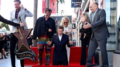 Willem Dafoe reacts as he unveils his star on the Hollywood Walk of Fame in Los Angeles. “So I'm glad to be with people like this and hopefully we're making this a better world somehow,” he said at the event. (REUTERS)