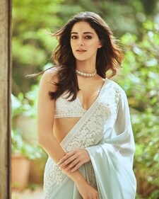 Ananya Panday in a white barely there blouse with a icy blue saree (Photo: Instagram) Ananya Panday in a white barely there blouse with a icy blue saree (Photo: Instagram)