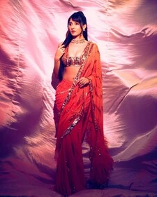 Nora Fatehi in a square neckline barely there blouse (Photo: Instagram) Nora Fatehi in a square neckline barely there blouse (Photo: Instagram)