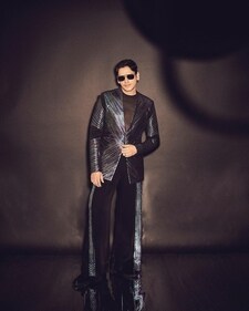 Vijay Varma in a black metallic structured jacket teamed with a sheer shirt and wide leg trousers (Photo: Instagram) Vijay Varma in a black metallic structured jacket teamed with a sheer shirt and wide leg trousers (Photo: Instagram)