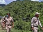 A police patrol party in a violence-hit area of Manipur.