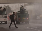 An anti-smog gun sprays water into the atmosphere to reduce dust pollution at Anand Vihar in New Delhi on January 6. (Sakib Ali/HT Photo)