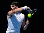 Spain's Carlos Alcaraz plays a forehand return during a practice session ahead of the Australian Open tennis championships at Melbourne Park Spain's Carlos Alcaraz plays a forehand return during a practice session ahead of the Australian Open tennis championships at Melbourne Park