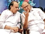 NCP founder Sharad Pawar (R) with his nephew Ajit Pawar. (HT PHOTO)