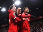 Liverpool's Cody Gakpo celebrates scoring their second goal with Curtis Jones and Darwin Nunez
