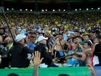 FILE - Police break up a fight between Brazilian and Argentinian fans that broke out prior to a qualifying soccer match for the FIFA World Cup 2026