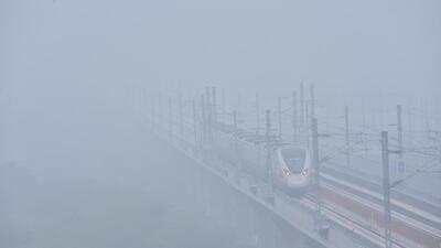 An RRTS train is barely visible in the heavy fog and pollution in Ghaziabad on a cold January morning. (Sakib Ali/HT Photo) An RRTS train is barely visible in the heavy fog and pollution in Ghaziabad on a cold January morning. (Sakib Ali/HT Photo)