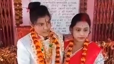 A lesbian couple from West Bengal after their marriage in a traditional ceremony, at a temple in Deoria district of Uttar Pradesh. (PTI)