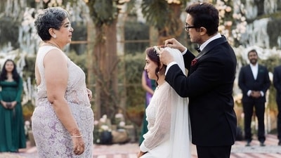 A candid picture also showed Aamir Khan adjusting Ira Khan's veil ahead of the wedding ceremony while Reena looked at teh father-daughter. Newlyweds Ira Khan and Nupur Shikhare married in a Christian wedding at Udaipur's Taj Aravali Resort and Spa. A candid picture also showed Aamir Khan adjusting Ira Khan's veil ahead of the wedding ceremony while Reena looked at teh father-daughter. Newlyweds Ira Khan and Nupur Shikhare married in a Christian wedding at Udaipur's Taj Aravali Resort and Spa. 