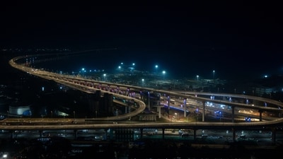 MTHL was built using 177,903 metric tonnes of steel and 504,253 metric tonnes of cement. The bridge will make travel easier between Mumbai and Navi Mumbai by reducing the time to just 20 minutes which would otherwise take 2 hours. (ANI) MTHL was built using 177,903 metric tonnes of steel and 504,253 metric tonnes of cement. The bridge will make travel easier between Mumbai and Navi Mumbai by reducing the time to just 20 minutes which would otherwise take 2 hours. (ANI)