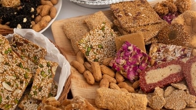Gur ki gajak: Gajak is a sweet made from sesame seeds or peanuts and jaggery (gur). The jaggery is melted and mixed with the seeds to form a brittle, sweet snack. (Unsplash) Gur ki gajak: Gajak is a sweet made from sesame seeds or peanuts and jaggery (gur). The jaggery is melted and mixed with the seeds to form a brittle, sweet snack. (Unsplash)