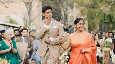 In one of the pictures, Nupur Shikhare was seen walking down the aisle with his mother Pritam Shikhare. He was blowing a kiss and looking at someone. Nupur was in a beige tuxedo, while his mother, who is a classical dancer, wore a saree. In one of the pictures, Nupur Shikhare was seen walking down the aisle with his mother Pritam Shikhare. He was blowing a kiss and looking at someone. Nupur was in a beige tuxedo, while his mother, who is a classical dancer, wore a saree. 
