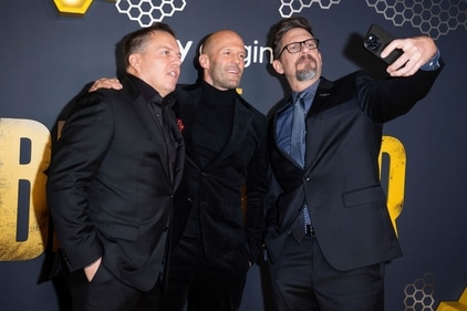 Chris Long, Jason Statham and David Ayer pose for a selfie at the UK premiere of The Beekeeper on Wednesday in London. (AP) Chris Long, Jason Statham and David Ayer pose for a selfie at the UK premiere of The Beekeeper on Wednesday in London. (AP)