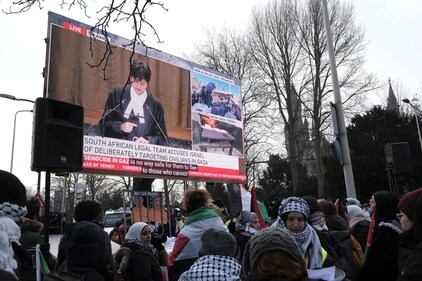 A digital banner, calling for the return of the hostages kidnapped during the Oct. 7 Hamas cross-border attack in Israel, stands outside the International Court of Justice prior to a hearing in The Hague, Netherlands. (AP) A digital banner, calling for the return of the hostages kidnapped during the Oct. 7 Hamas cross-border attack in Israel, stands outside the International Court of Justice prior to a hearing in The Hague, Netherlands. (AP)