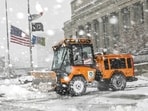 City teams remove snow as it falls during a blizzard. (Geoff Stellfox/The Gazette via AP) City teams remove snow as it falls during a blizzard. (Geoff Stellfox/The Gazette via AP)
