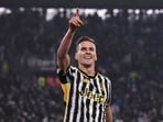 Juventus' Arkadiusz Milik celebrates after scoring