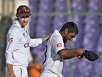 England's Rehan Ahmed, right, is congratulated by teammate Joe Root England's Rehan Ahmed, right, is congratulated by teammate Joe Root