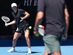 Poland's Iga Swiatek hits a shot during a practice session on Rod Laver Arena in Melbourne on January 11, 2024, ahead of the Australian Open tennis tournament Poland's Iga Swiatek hits a shot during a practice session on Rod Laver Arena in Melbourne on January 11, 2024, ahead of the Australian Open tennis tournament