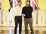 Ukrainian President Volodymyr Zelensky (R) and Britain's Prime Minister Rishi Sunak shake hands at the end of a press conference. Ukrainian President Volodymyr Zelensky (R) and Britain's Prime Minister Rishi Sunak shake hands at the end of a press conference.