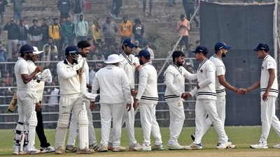 Mumbai team players exchange handshakes with each other after winning by an innings and 51 runs against the Bihar team during fourth day of the Ranji Trophy cricket match between Mumbai and Bihar, at Moin-ul-Haq Stadium in Patna (Pappi Sharma.)