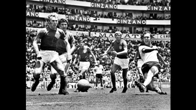 Beckenbauer (right) plays in the quarter-final against England at the 1970 World Cup. (Getty Images) Beckenbauer (right) plays in the quarter-final against England at the 1970 World Cup. (Getty Images)