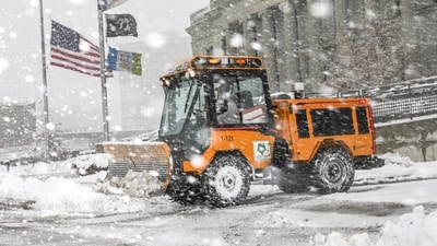 City teams remove snow as it falls during a blizzard. (Geoff Stellfox/The Gazette via AP) (AP) City teams remove snow as it falls during a blizzard. (Geoff Stellfox/The Gazette via AP) (AP)