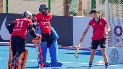 Indian women's hockey team captain Savita Punia with teammate Bichu Devi Kharibam and head coach Janneke Schopman during a training session ahead of the FIH Hockey Olympic Qualifiers 2024 match against USA (PTI) Indian women's hockey team captain Savita Punia with teammate Bichu Devi Kharibam and head coach Janneke Schopman during a training session ahead of the FIH Hockey Olympic Qualifiers 2024 match against USA (PTI)