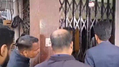 ED officials enter premises of Sujit Bose. (ANI) ED officials enter premises of Sujit Bose. (ANI)