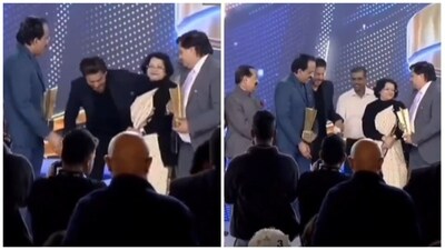 Shah Rukh Khan praised for including 'shy' ISRO scientist in group photo. Shah Rukh Khan praised for including 'shy' ISRO scientist in group photo.