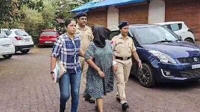 Suchana Seth, 39-year-old start-up CEO, being escorted by police during investigation in the murder case. Suchana Seth, 39-year-old start-up CEO, being escorted by police during investigation in the murder case.