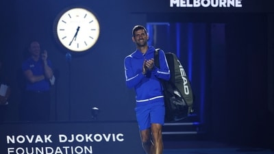 Serbia’s Novak Djokovic arrives to play a charity match against Greece’s Stefanos Tsitsipas ahead of the Australian Open tennis tournament at Melbourne Park (REUTERS)