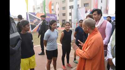 The CM interacting with female players at Mahant Avaidyanath Stadium in Gorakhpur on Jan 12. (HT photo) The CM interacting with female players at Mahant Avaidyanath Stadium in Gorakhpur on Jan 12. (HT photo)