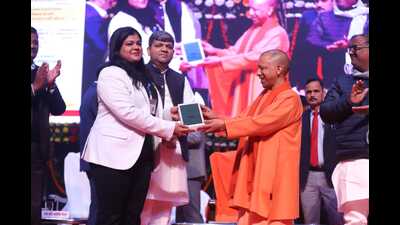 U.P. chief minister Yogi Adityanath presenting a tablet to a student at an event in Lucknow on Jan 12, 2024. (Sourced) U.P. chief minister Yogi Adityanath presenting a tablet to a student at an event in Lucknow on Jan 12, 2024. (Sourced)