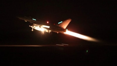 In this image provided by the UK Ministry of Defence taken on Thursday Jan. 11, 2024 shows an RAF Typhoon aircraft taking off from RAF Akrotiri in Cyprus, for a mission to strike targets in Yemen. The US and British militaries bombed more than a dozen sites used by the Iranian-backed Houthis in Yemen late on Thursday. (AP) In this image provided by the UK Ministry of Defence taken on Thursday Jan. 11, 2024 shows an RAF Typhoon aircraft taking off from RAF Akrotiri in Cyprus, for a mission to strike targets in Yemen. The US and British militaries bombed more than a dozen sites used by the Iranian-backed Houthis in Yemen late on Thursday. (AP)