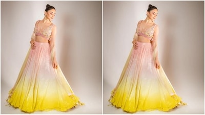 Rakul's lehenga ensemble features a V-neck bralette top embellished with crystal embroidery and fl;oarl motifs. She paired it with a shimmering lehenga skirt in pastel shades of pink and yellow. The matching net duppata completed the glam look.&nbsp;&nbsp;&nbsp;&nbsp;&nbsp;&nbsp; (Instagram/@rakulpreet)