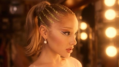 Ariana Grande wore glitter in a stripped pattern (Instagram) Ariana Grande wore glitter in a stripped pattern (Instagram)