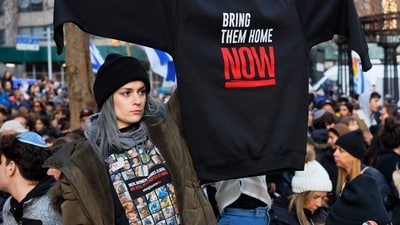 People attend a rally for the release of the hostages kidnapped by Hamas at Dag Hammarskjold Plaza near the UN Headquarters on January 12, 2024 in New York City. (Getty Images via AFP) People attend a rally for the release of the hostages kidnapped by Hamas at Dag Hammarskjold Plaza near the UN Headquarters on January 12, 2024 in New York City. (Getty Images via AFP)