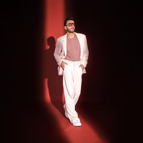 Ranveer Singh in a white blazer set paired with a mauve tee (Photo: Instagram) Ranveer Singh in a white blazer set paired with a mauve tee (Photo: Instagram)