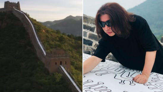 The image shows the record-creating artist on top of the Great Wall of China. (GWR)