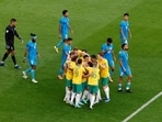 Australia's Jordan Bos celebrates scoring their second goal with teammates