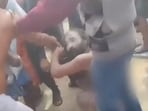 A group of sadhus being purportedly stripped and assaulted by a mob in Bengal's Purulia district.