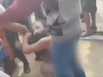 A group of sadhus being purportedly stripped and assaulted by a mob in Bengal's Purulia district. A group of sadhus being purportedly stripped and assaulted by a mob in Bengal's Purulia district.